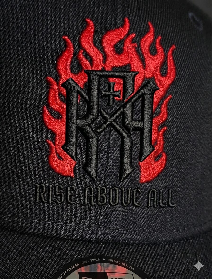 RAA embroidered cap detail, flame monogram